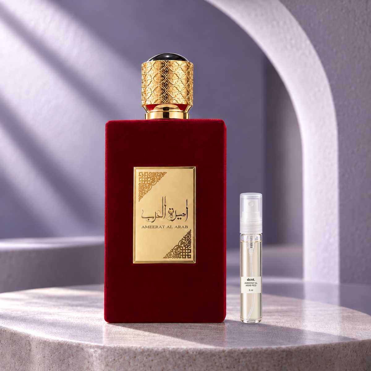 Ameerat Al Arab Red original perfume bottle beside a filled 5 ml dcnt.ph glass decant