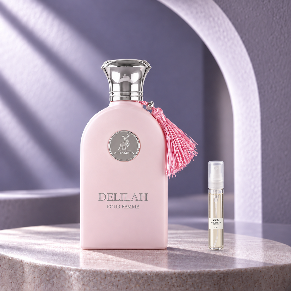 Delilah Pour Femme original perfume bottle beside a filled 5 ml dcnt.ph glass decant