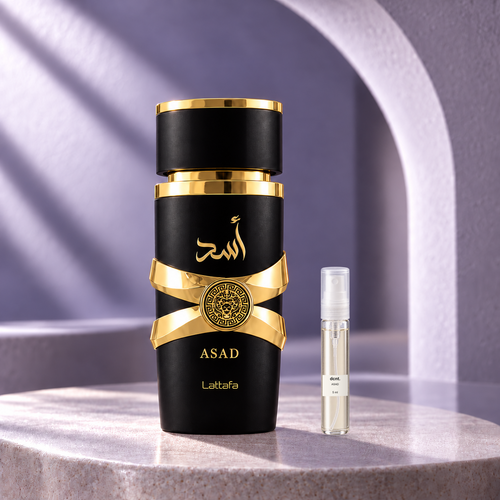 Asad original perfume bottle beside a filled 5 ml dcnt.ph glass decant